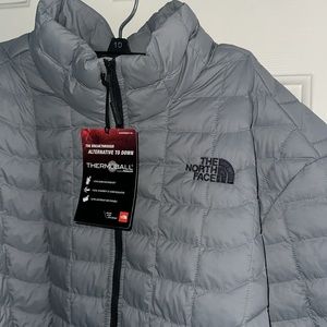 gray north face jacket